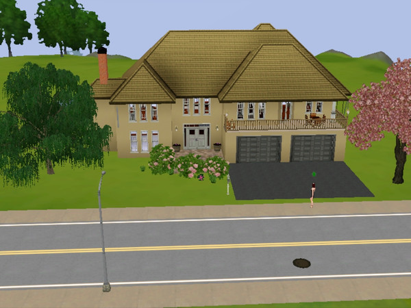 Sims 3 — 15 Maple Drive by CrazyxChaosRaWr — This spacious 2 bedroom, 2 1/2 bathroom house has 2 garage stalls, a pond